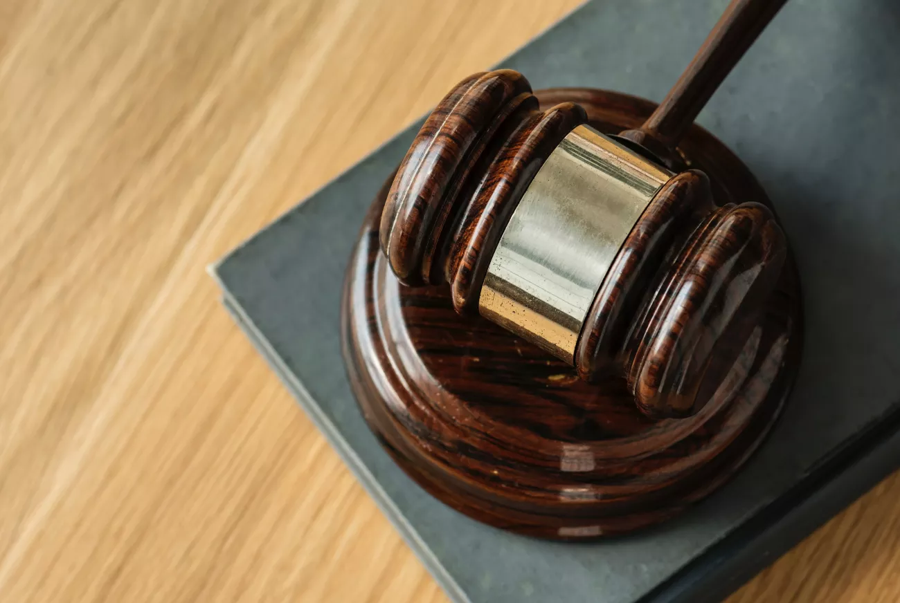 Court Gavel on Wooden Table